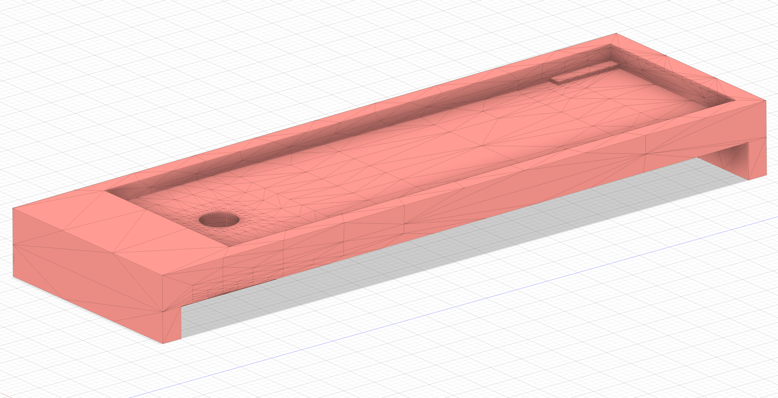 CAD rendering of the next wedge iteration as a salmon-colored tray with a raised ramp